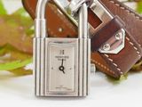 an image of a watch with a padlock attached to it