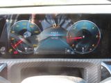a car dashboard with various gauges and numbers on it
