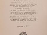 an old book with a black and white image of a woman