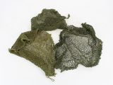 two bags of netted material on a white surface