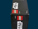 a box of lego star wars items on a blue background