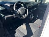 a small car with a steering wheel in the front seat