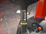 a scooter that is parked in a parking lot