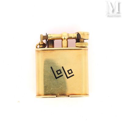 a gold lighter with the word lee written on it