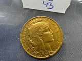 a close up of a coin in a plastic bag on a table