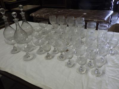 a lot of empty wine glasses on a table