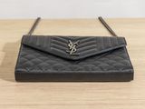 saint laurent black quilted leather clutch bag