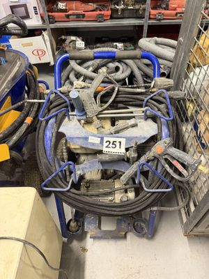 a pile of hoses and other tools in a store