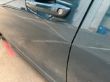 a close up of a door handle on a car