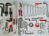 a picture of a variety of tools laid out on a table