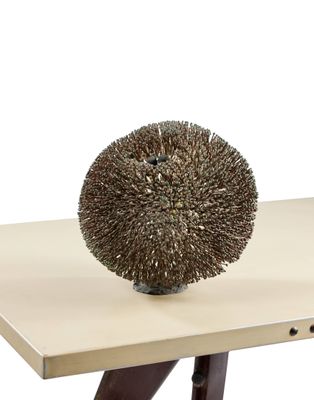 an image of a table with a decorative object on it