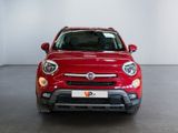 the front view of a red fiat suv parked in a showroom