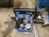 a machine that is sitting on the ground in the garage