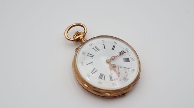 Montre de poche « à gousset » en or 18 carats 750 millièmes à déc...