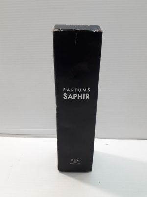 a black box of perfume sitting on top of a white table