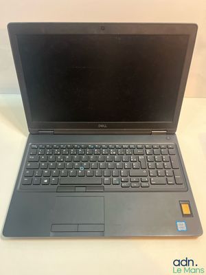 an open laptop computer sitting on top of a white table