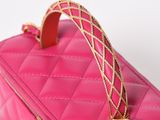 chanel pink quilted leather handbag with gold chain handles