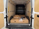 boxes in the back of a van with the door open