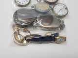 many different types of pocket watches in the bag