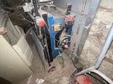 an image of a room that has a water heater in it