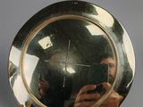 a picture of a person taking a picture of themselves in a mirror