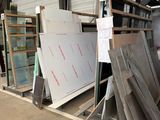 many different types of glass and metal in a warehouse