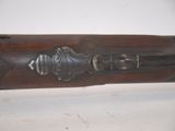 a close up of a baseball bat on a white surface