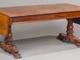 a small table with a drop leaf on top of it