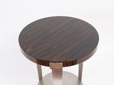 a close up of a wooden table with a metal base