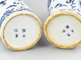 pair of blue and white porcelain vases with gold rims