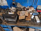 many tools on a workbench in a garage