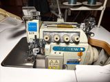 a sewing machine that is sitting on a table