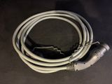 a white cord that is connected to a computer mouse