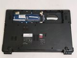 a laptop with a hard drive attached to the back of it
