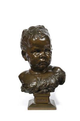 bronze bust of a young boy with hands on his chest