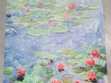 un tableau représentant des nénuphars à la surface d'un étang