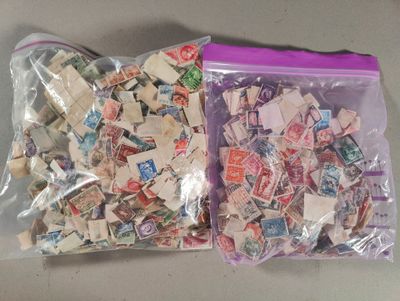 a bag full of stamps sitting on a table