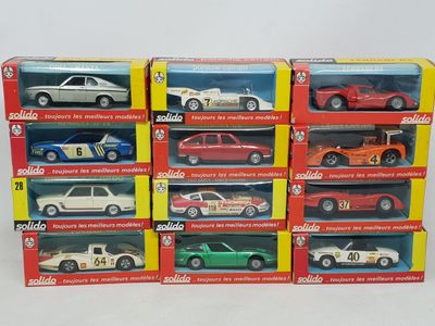 a lot of different model cars in the box
