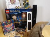 a harry potter hat on a table next to some legos