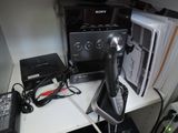 a picture of a phone and other electronics on a desk