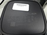 an image of a black cell phone with a barcode on it