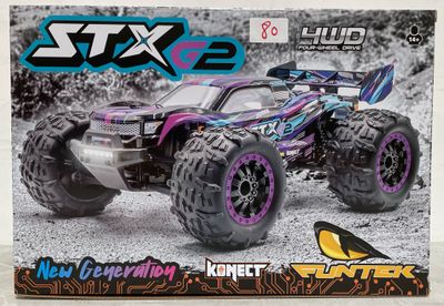 une image représentant un monster truck miniature dans une boîte