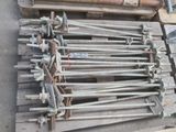many pieces of metal that are stacked on a pallet