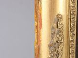an image of a close up of a gold frame on a wall