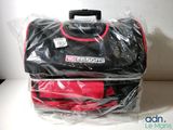 a black and red bag that is wrapped in plastic