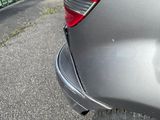 a car that is parked on the side of the road