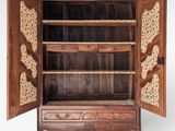 an image of a wooden cabinet with two doors open