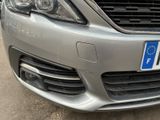 a close up of a car ' s front grille with a european flag on it