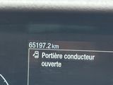 a close up of a speedometer on a car ' s dashboard