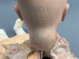 a close up of a clay sculpture of a head